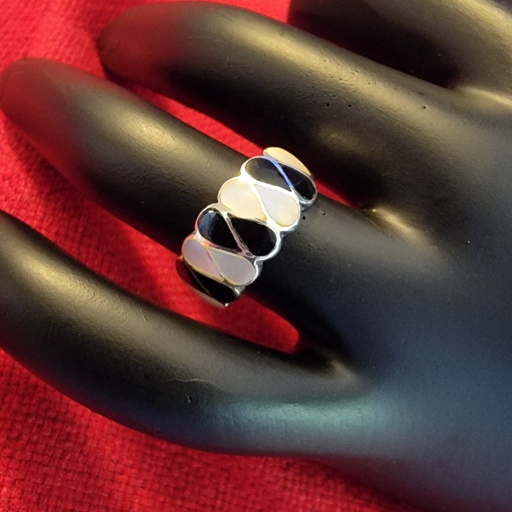 Silver black and white ring